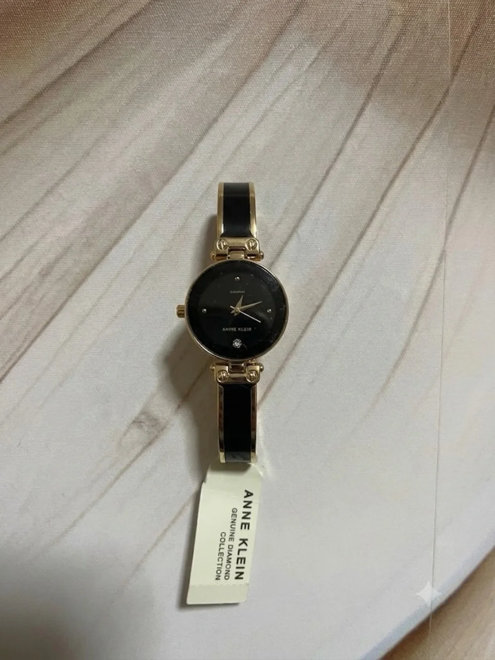 Anne Klein Black and Gold Bangle Watch